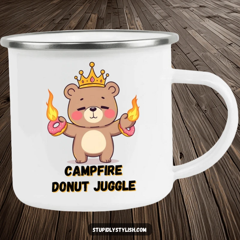 Funny, enamel camping mug depicting a tiny crowned bear nervously juggling flaming donuts with a nervous smile.