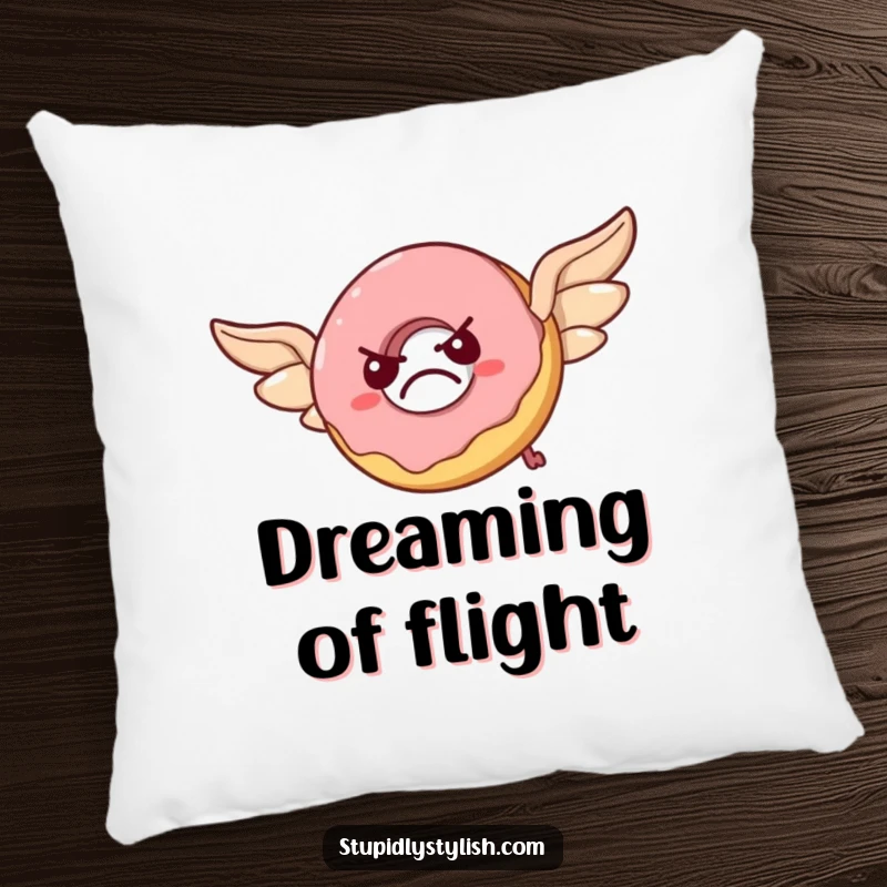 Funny pillow featuring a grumpy donut attempting flight with pastry wings, looking flustered and ready for a cozy, comical nap.