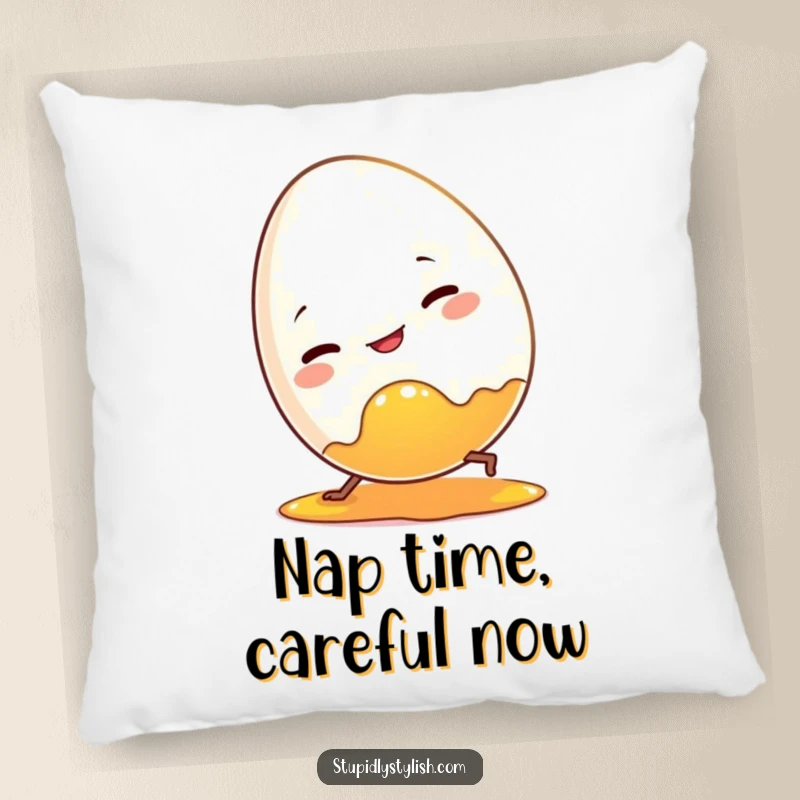 Funny pillow featuring a clumsy egg character stumbling over its own bright yolk. Soft and humorous decor.
