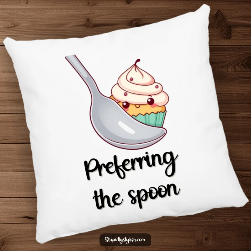 Funny shy cupcake pillow featuring a cupcake character peeking out from behind a large spoon, perfect for adding cute, humorous decor.