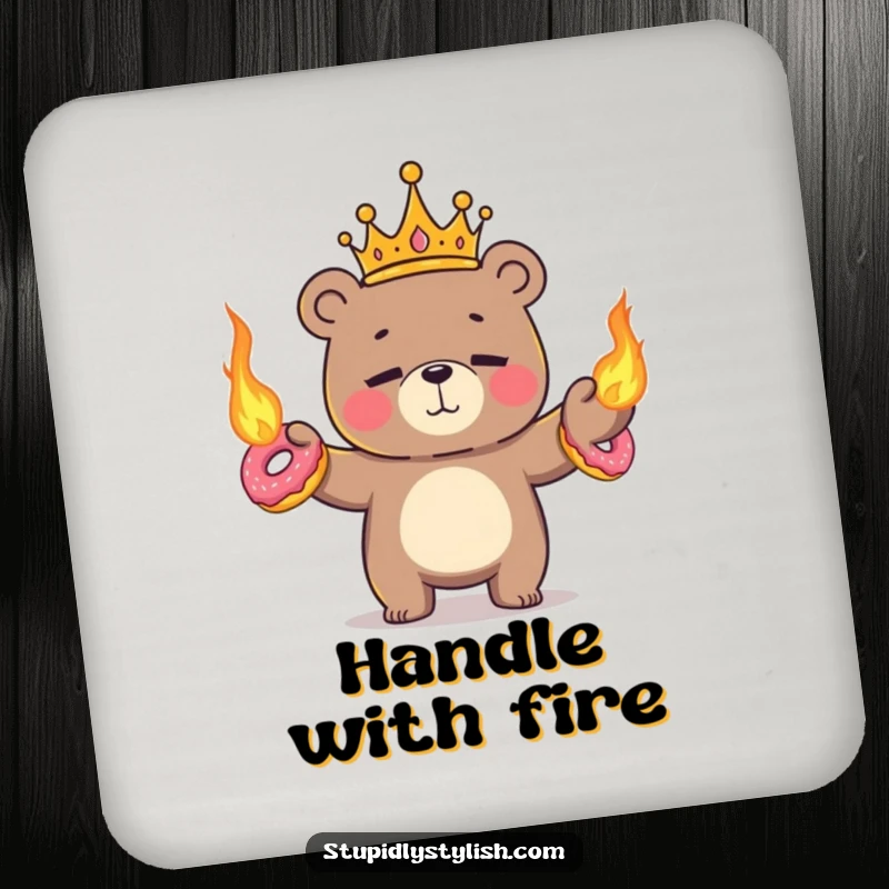 Funny, absorbent coaster featuring a tiny crowned bear nervously juggling flaming donuts with a nervous smile.