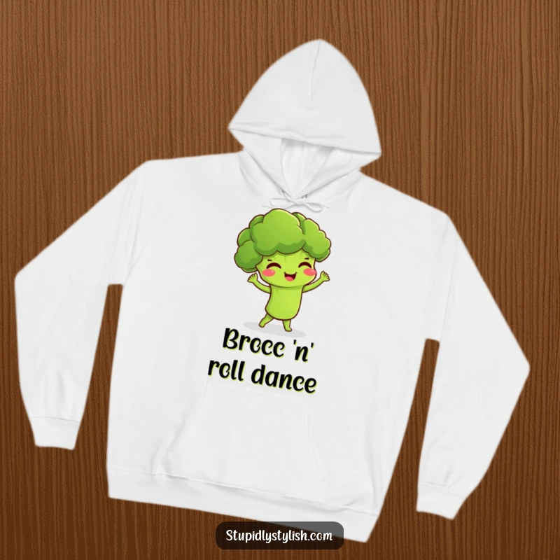 Funny hoodie featuring a giggling broccoli character performing a silly dance, designed for warmth and maximum fun.