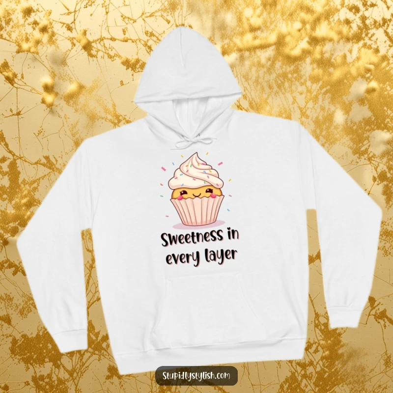 Funny hoodie depicting a jubilant cupcake with a chaotic, joyful explosion of sprinkles flying around its head, offering comfort and humor.