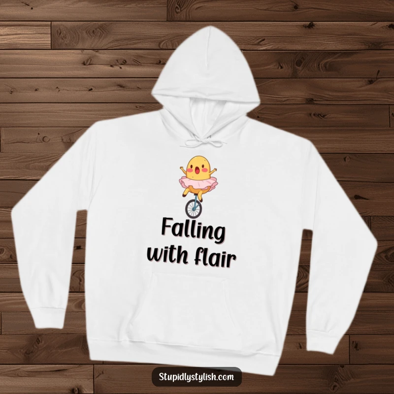 Funny, warm hoodie featuring a surprised potato in a ballet tutu falling off a unicycle.