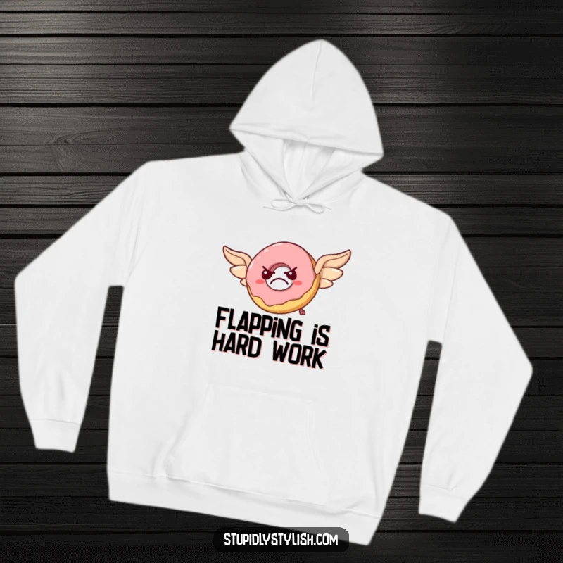 Funny hoodie graphic: A grumpy donut flapping pastry wings, trying to fly but looking flustered, a hilarious sight for cozy wear.