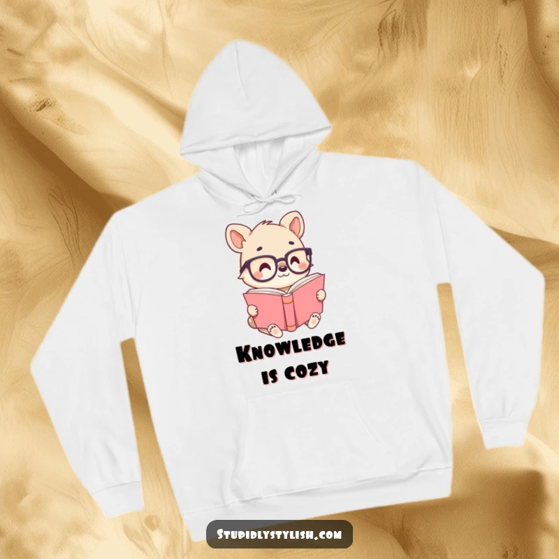 Cute animal character wearing tiny glasses, absorbed in a massive book, ideal for a cozy hoodie representing intellectual pursuits and humor.