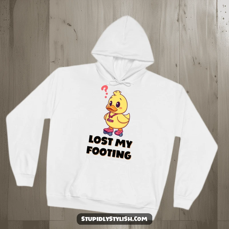 Funny hoodie featuring a confused rubber duck character on roller skates, offering warm comfort and a humorous depiction of unexpected journeys.