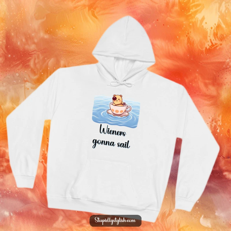Funny hoodie: hot dog paddling a teacup across the ocean, a humorous and cozy statement piece.