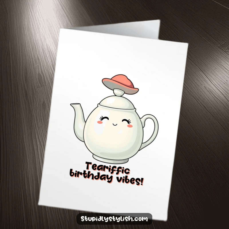 Free Printable Birthday Card: A stylish teapot character dons a tiny, fashionable hat, offering elegant birthday wishes. Downloadable.