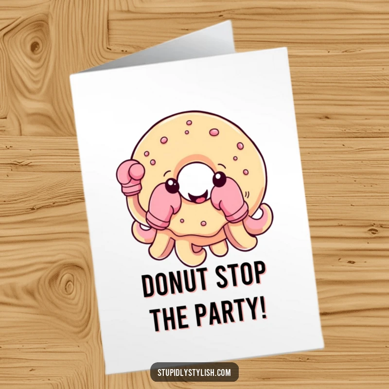 Funny Free Printable Birthday Card: Cheerful, round donut with small tentacles wearing boxing gloves, ready to celebrate.