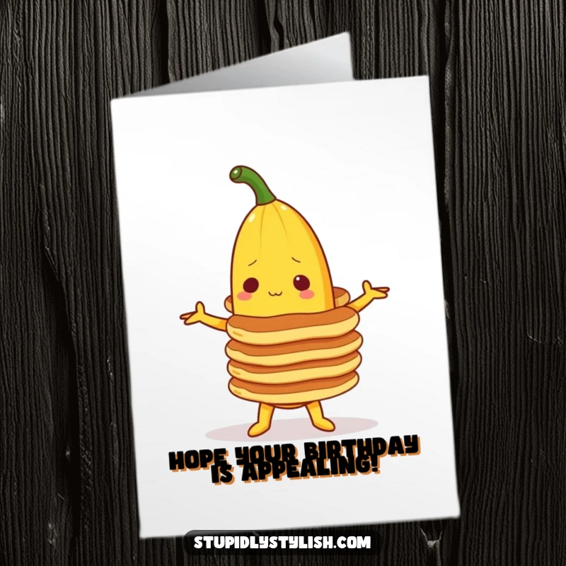 Funny Free Printable Birthday Card showing a determined banana character struggling to balance a tall stack of pancakes.