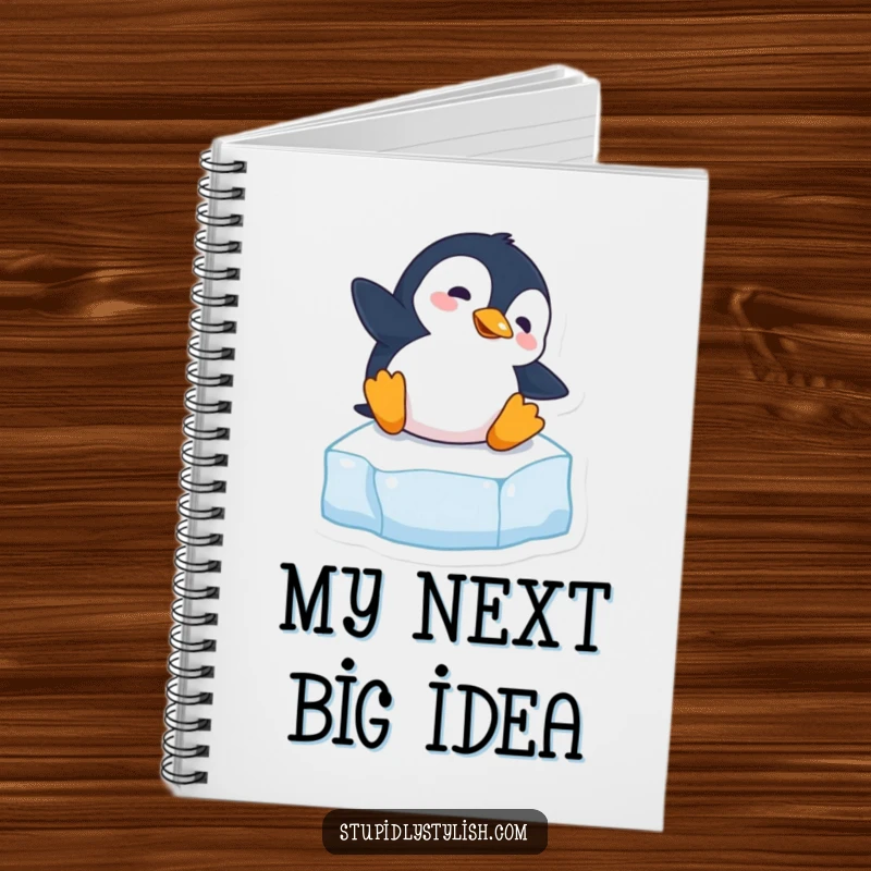 Funny notebook featuring a clumsy penguin slipping on ice, perfect for journaling or note-taking with a humorous touch.