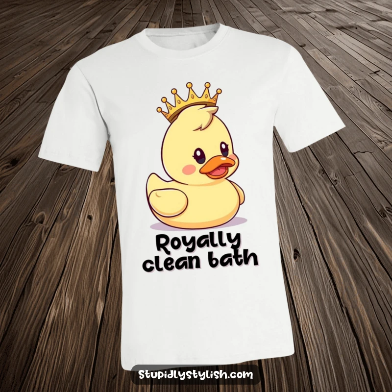 Funny T-Shirt: A rubber duck adorned with a small crown, looking surprised, ideal for quirky fashion.