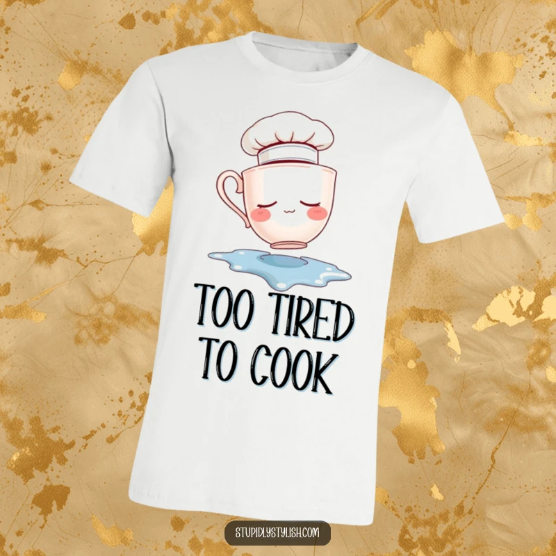 Funny T-shirt print of a sleepy teacup wearing a chef hat, falling into a spilled puddle. Humorous apparel for kitchen enthusiasts.