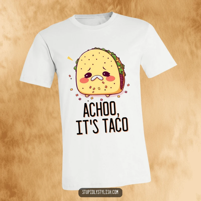 Funny t-shirt print of a taco sneezing with its fillings flying everywhere, a comical and relatable food design.
