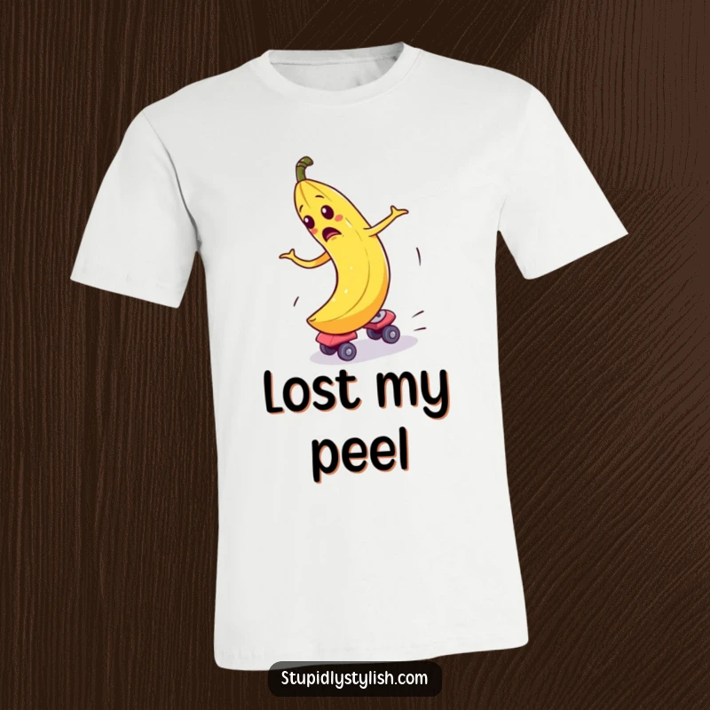Funny T-Shirt featuring a bewildered banana comically spinning out of control while wearing roller skates, pure hilarious chaos.