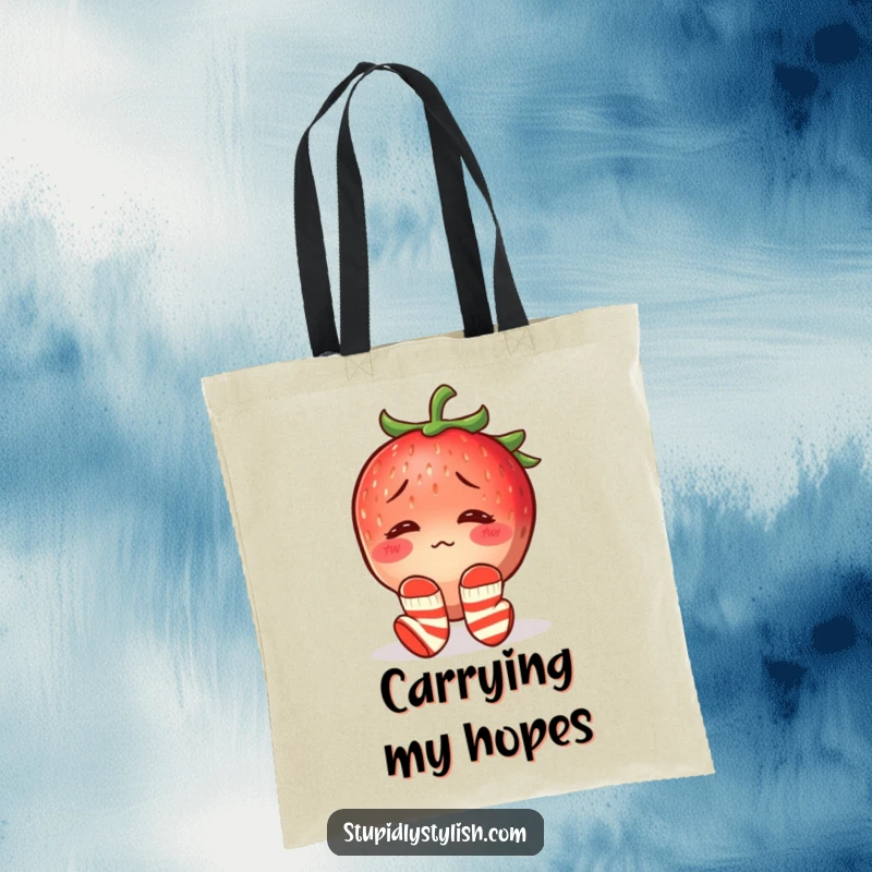 Funny tote bag with a confused, blushing strawberry wearing mismatched socks, designed for stylish and humorous everyday use.