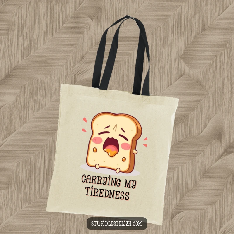 Funny Tote Bag showing a tired toast character yawning with jam, perfect for carrying essentials while expressing relatable morning exhaustion humorously.