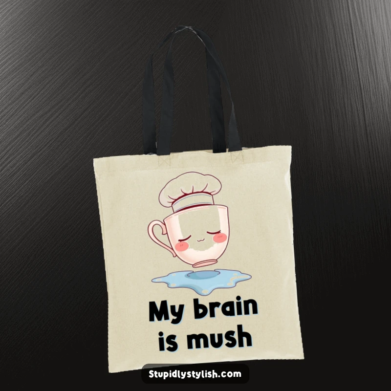 Funny tote bag showing a sleepy teacup chef hat falling into a spilled puddle. A humorous and practical carry-all.